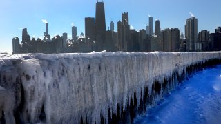 In this file photo, ice forms along the shore of Lake Michigan as temperatures hang in the single digits on January 26, 2022 in Chicago, Illinois.