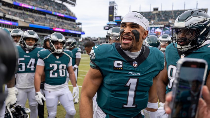PHILADELPHIA, PENNSYLVANIA – JANUARY 26: Jalen Hurts #1 of the Philadelphia Eagles leads the huddle  before the games against Washington Commanders at Lincoln Financial Field on January 26, 2025 in Philadelphia, Pennsylvania. The Eagles beat the Commanders 55-23. (Photo by Lauren Leigh Bacho/Getty Images)