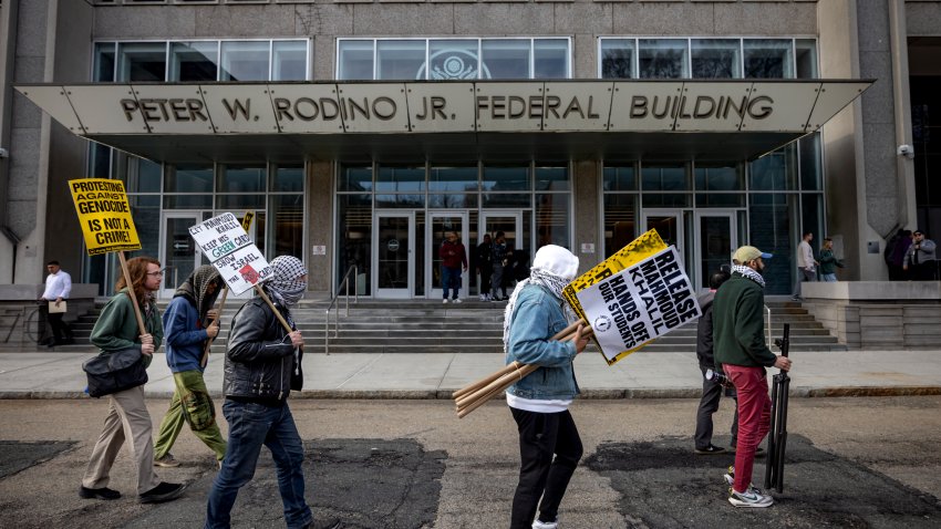 NEWARK, NEW JERSEY, UNITED STATES – 2025/03/28: Protestors carry signs as hundreds rally outside a New Jersey Federal Courthouse protesting the arrest and detention of Mahmoud Khalil. More protests against the Trump Administration’s immigration policies and tactics have spread across the country after Secretary of State Marco Rubio’s recent announcement that he has revoked at least 300 student visas for alleged participation in Pro-Palestinian activity on campuses.