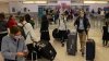 Trump's new travel ban takes effect as tensions escalate over immigration enforcement